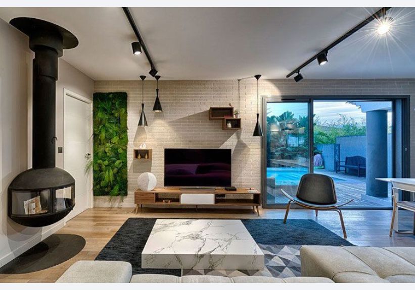 Image du modèle de maison interieur salon cheminé pisicne 
