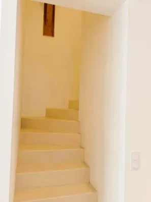 Image du modèle de maison escalier béton ciré